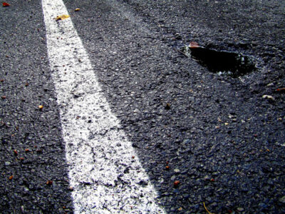 Hate Group Blames Immigrants for Potholes